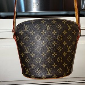 Guaranteed AUTHENTIC Louis Vuitton Drouot crossbody.